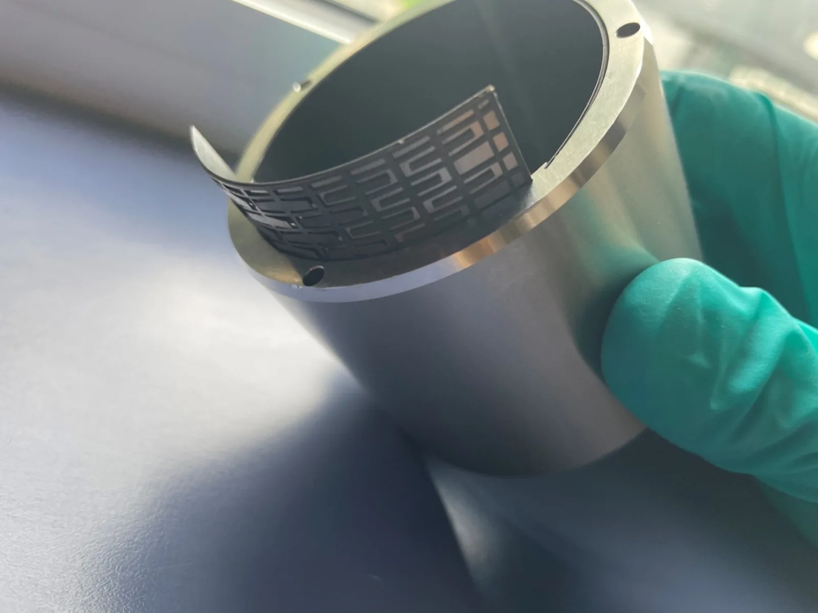 Three-lobe radial gas foil bearing with compliant foil structure